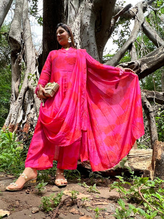 A fusion of the traditional saree drape with a modern kurta top worn with culotte pants.